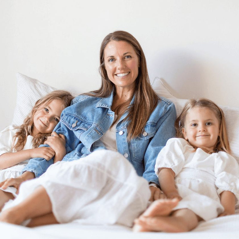 Catherine Hart with her two daughters